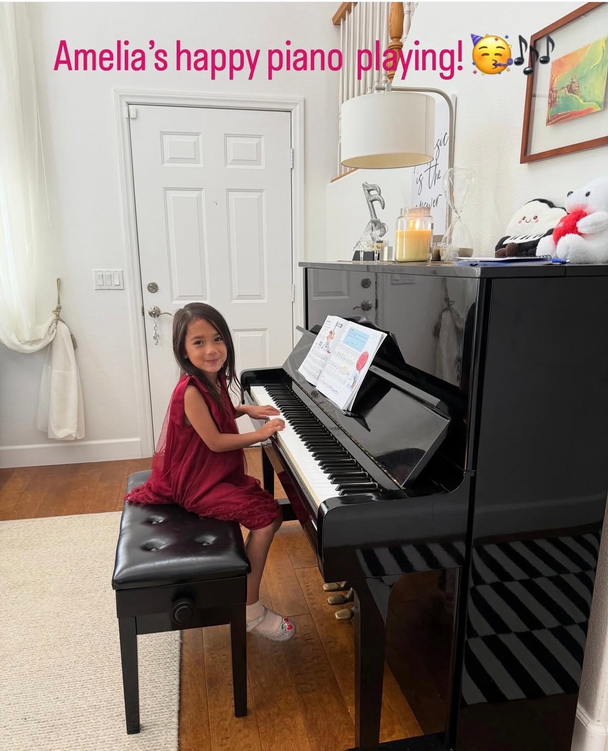 Young student playing a black piano during a music lesson