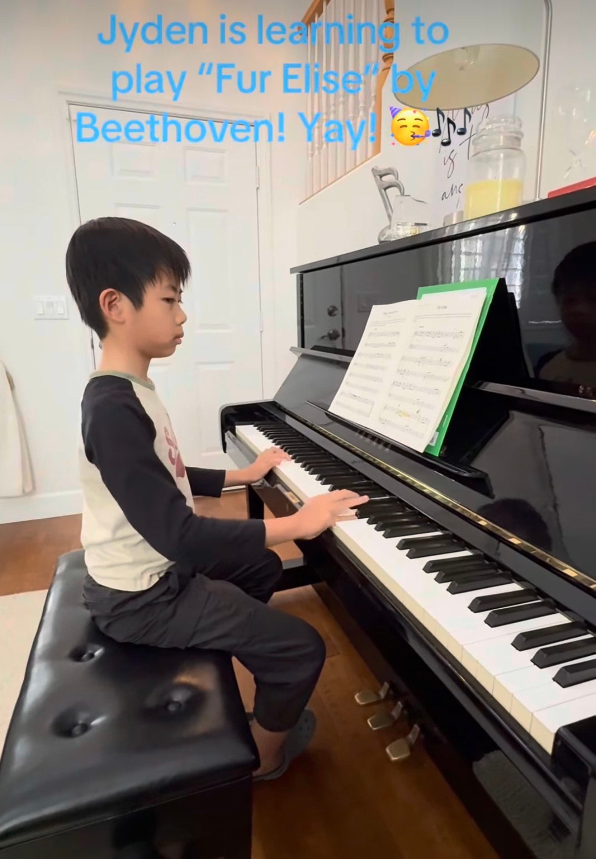 Piano student learning Fur Elise by Beethoven