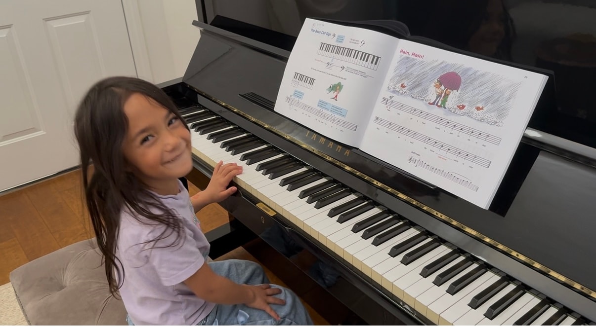 Songwriting student bringing her musical ideas to a lesson
